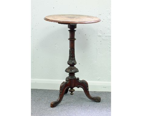 A Victorian walnut and inlaid tripod table, the circular top on a turned and carved support, 47.5cm diameter