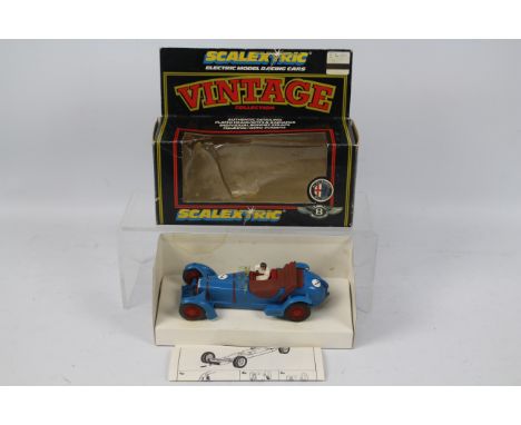 Scalextric - A boxed 1990's Scalextric 'Vintage Collection' C306 2.3 litre Alfa Rome. The model in blue with RN7 appears to b