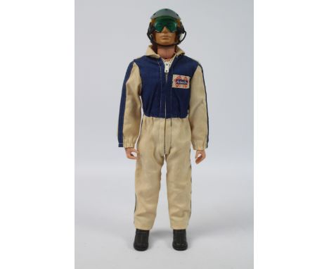 Palitoy, Action Man - A Palitoy blonde painted soft headed Action Man figure in a rare GI Joe 'Action Joe Race Car Driver' ou