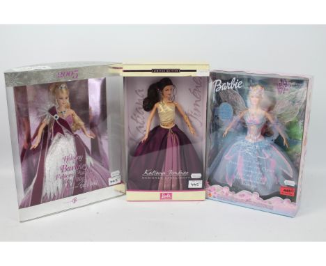 Mattel Barbie - 3 boxed Barbie dolls. A boxed Holiday Barbie 2005 (No G8058) by Bob Mackie. A boxed Barbie of Swan Lake Odett