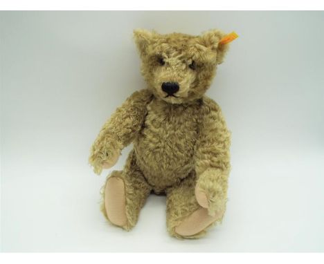Steiff - a Teddy Bear with growler, issued in a limited edition (No 000751), 39 cm (h) yellow tag and button to ear, felt pad