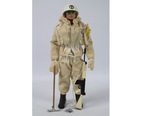 Palitoy, Action Man - An unboxed vintage Palitoy black painted hard head Action Man on Atomic Man body dressed in Ski Patrol 