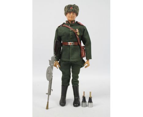 GI Joe, Hasbro - A GI Joe red painted 'Foreign Head'  figure, in Palitoy Action Man Russian Infantryman outfit. The figure wi