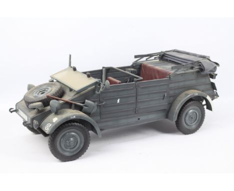 Dragon - A boxed Dragon #710150 WWII German Forces 1:6 scale Kubelwagen Type 82. The model appears to be in Good very dusty c