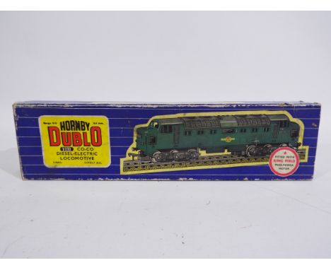 Hornby - Dublo - A boxed Co-Co Diesel-Electric 3 rail locomotive # 3232. The model shows signs of use and appears in Good ove
