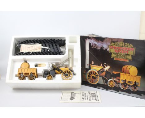 Hornby - A boxed Real Steam Stephensons Rocket # G100-9140 The model shows signs of use and is dusty from storage and would b