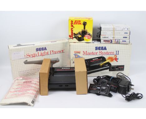 Sega Master System ii - Sega Master System ii in box with additional controller , Sonic The Hedgehog, Alex The Kid built in, 