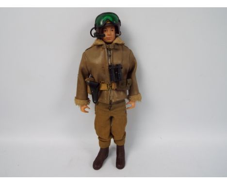 Palitoy, Action Man - A Palitoy brown painted hard head Action Man in Armoured Car Commander outfit. The hard hand figure is 