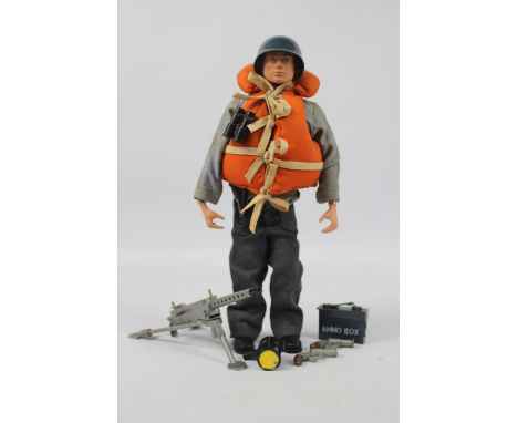 Palitoy, Action Man - A Palitoy dark brown painted hard head Action Man figure in Navy Attack outfit. The figure with hard ha