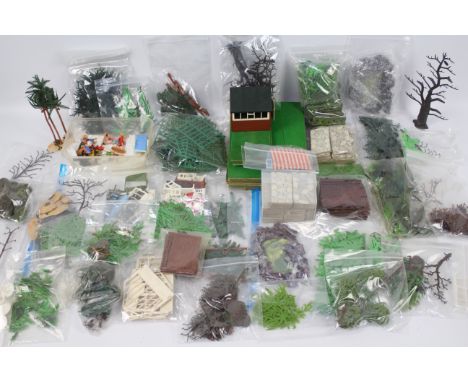 Britains - A large quantity of plastic Garden items including 25 plus trees, 22 x lawn sections, 60 plus paving sections, a s