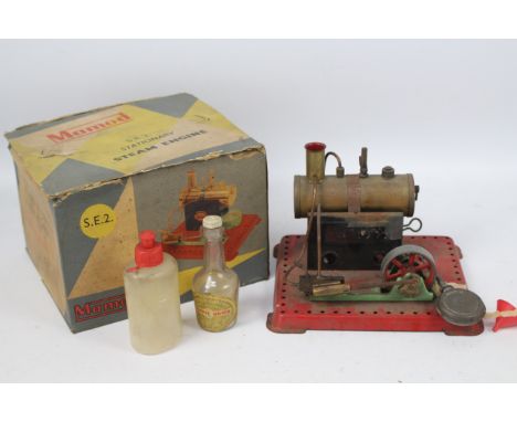 Mamod - A boxed Mamod Stationary Engine # S.E.2 with oiler and funnel. It is dirty from storage and would benefit from cleani