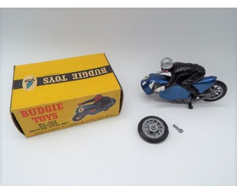 Budgie Toys - a die-cast Racing Motor Cyclist # 262, front wheel assembly left fork with clean break (part included in the lo