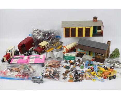 Britains - A collection including Riding Stable, a Wild West building, a quantity of walls, fencing, gates and jumps, also 2 