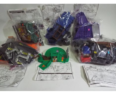 Hot Wheels - A collection of Hot Wheels accessories including Speed Shop, Roadway and Bank Robbery set. They all show light s