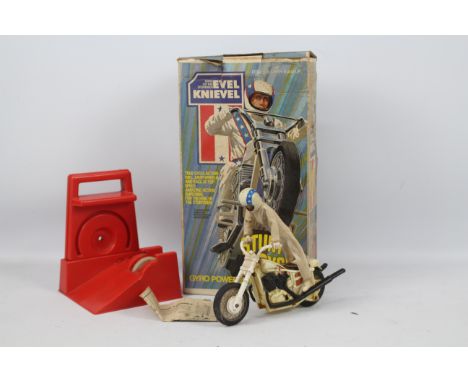 Ideal Toys - Evel Knievel Stunt Cycle with gyro powered launcher and Evel Knievel action figure, with operating instruction l