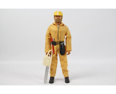 Palitoy, Action Man - A Palitoy blonde flock hair and bearded Action Man figure. The figure with gripping hands, is marked 'M
