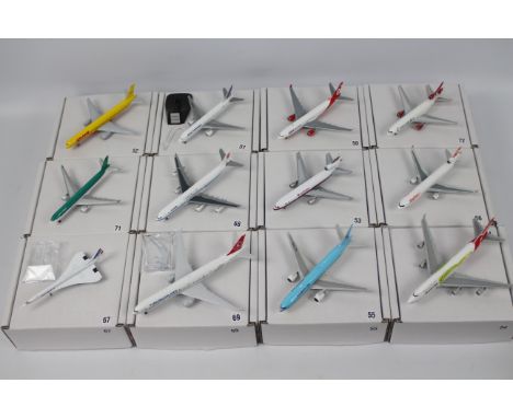 Socatec - Gemini Jets - A collection of 12 re-boxed diecast 1:400 scale model aircraft in various carrier liveries. No serial