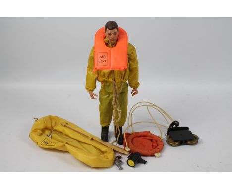 Palitoy, Action Man - A dark brown painted hard head Action Man in Breeches Buoy outfit. The hard hand figure is marked 'Made