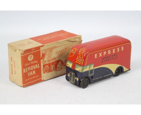 Chad Valley - A boxed clockwork 1950s Express Removal Van # 10133. The model is 15.5 cm long and appears in Very Good conditi