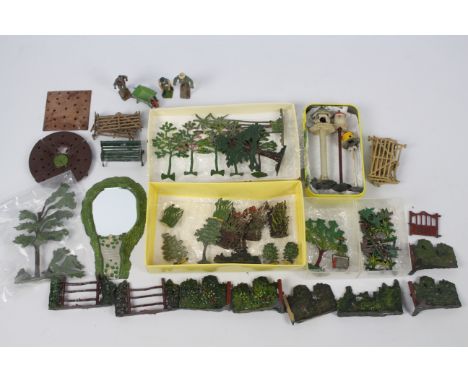 Britains - Garden - F.G.T. - A collection of vintage metal garden items including a pond, three figures, three dove cote's, n