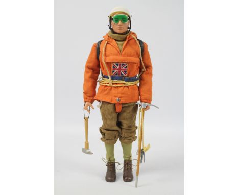 Palitoy, Action Man - A Palitoy blonde painted hard head Action Man figure in Mountaineer outfit. The hard hand figure is sta