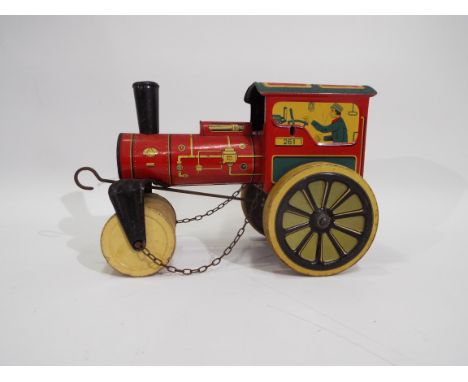 DGM - A vintage clockwork tinplate Steam Roller marked D.G.M. D.P. made in U.S.-Zone Germany. It measures approximately 23 cm