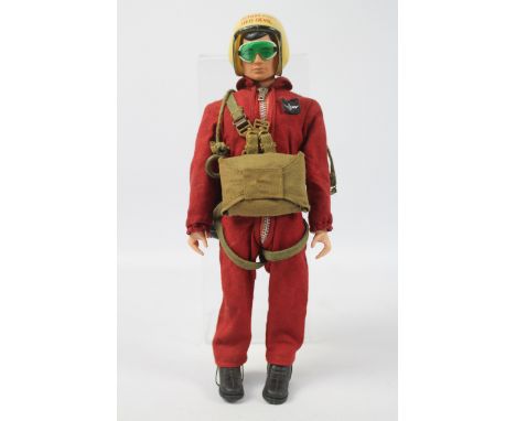 Palitoy, Action Man - A Palitoy Action Man Red Devil Parachutist figure. The black hard head figure with hard hands is marked