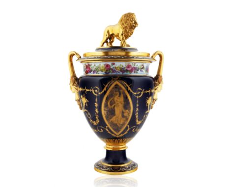 A LIKELY SEVRES PORCELAIN COVERED URNthe urn with two handles terminating from the heads of caryatids, the body featuring two