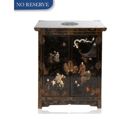 A MEIJI PERIOD JAPANESE EBONISED LACQUER CABINET rectangular, the top featuring a wood carved medallion with a foliate and fl