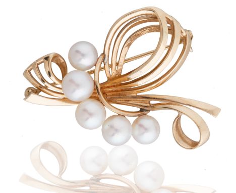 MIKIMOTO TOKYO CULTURED PEARL AND GOLD BROOCHfive cultured pearls set in 14KT gold, with a c-clasp, stamped twice maker's mar