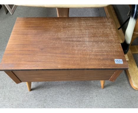 A small vintage sewing box.