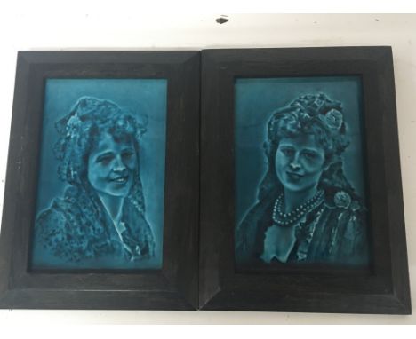 A pair of framed early 20th century ceramic portrait tiles possible Continental 22cmx30cm (2)