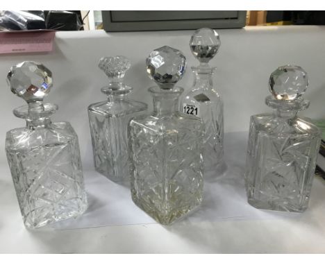 Five glass cut decanters. (No reserve)