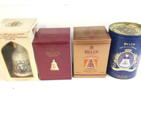 Four bottle of assorted bells scotch whisky including 1999 and 2000 Christmas decanter. Postage D