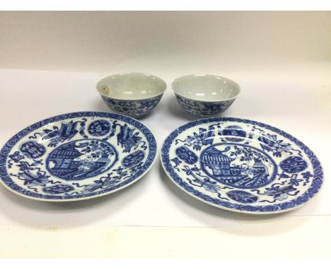 Four blue and white ceramic items comprising two bowls and two plates, largest diameter approx 23cm. Shipping category D.