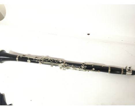 A Vintage ebony Clarinet maker Hans Kreul retailed by Meyer Bro New York stamped Medium Chambered. No box. Lenght 70cm