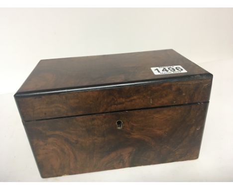 A Victorian walnut tea caddy of rectangular shape with a hinged top 22cmx13cm