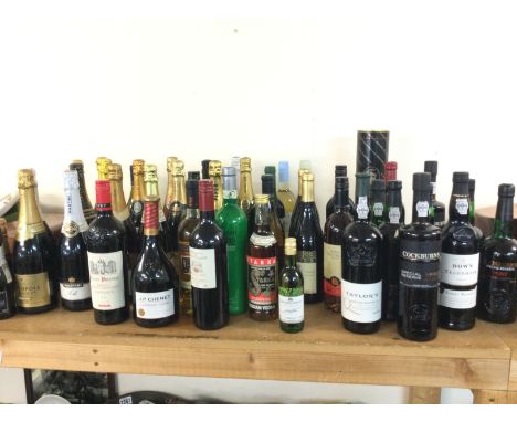 A large collection of various bottles of wine champagne port vodka etc. Postage D