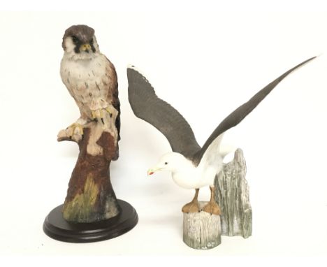 A hawk figure and a Franklin Mint ceramic gull figure. 31 & 26cm tall. Postage category D- NO RESERVE