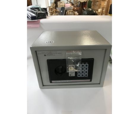 A small modern digital home safe with digital and manual locking. Comes with a set of keys. Approx 31x21x22cm