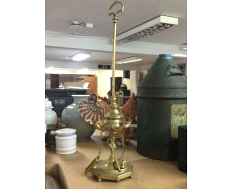 19th century tall brass students lamp with four burners and tools ,68cm tall. Postage category D