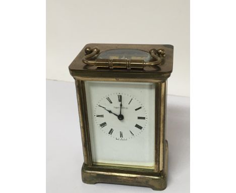 A brass cased carriage clock maker Mappin & Webb. Seen working with key.