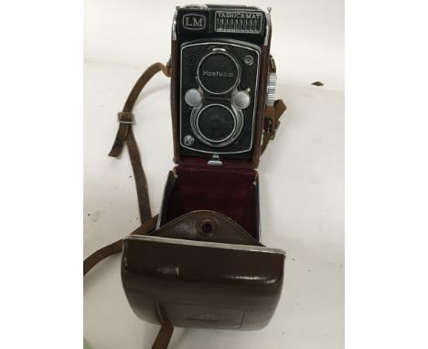 A leather cased Vintage Camera A Yashica Mat LM.