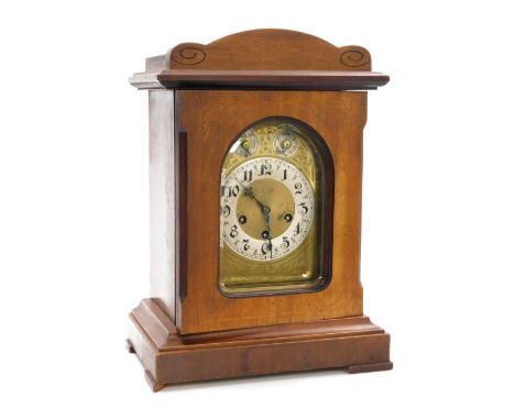 A Victorian mahogany mantel clock, domed brass dial, with silver chapter ring bearing Arabic numerals, subsidiary chime silen