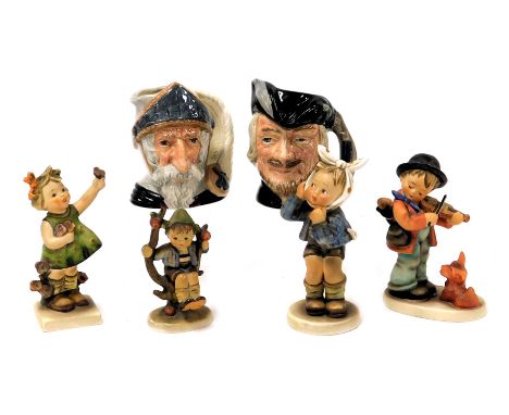 Two Royal Doulton pottery character jugs, modelled as Don Quixote D6460, and Robin Hood D6534, together with four Hummel figu