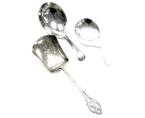 Three silver caddy spoons, comprising a George III silver caddy spoon, London 1801, a George V caddy spoon, with pierced term