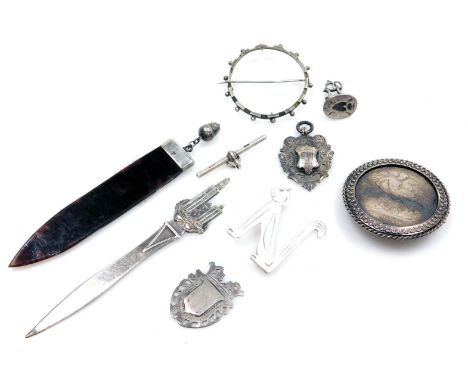 A group of silver and other vertu, comprising a silver mounted and tortoiseshell bookmark, with acorn finial, a white metal c