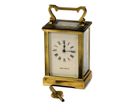 A Mappin &amp; Webb brass cased carriage clock, rectangular dial bearing Roman numerals, single barrel movement, the case of 