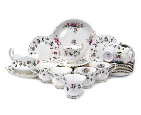 A Royal Albert porcelain Winsome pattern part dinner and tea service, comprising sauce boat on stand, three bread plates, ten