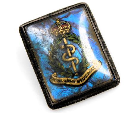 A Royal Army Medical Corps silver and butterfly wing badge, of rectangular form, decorated with crest and motto, 4.2g.